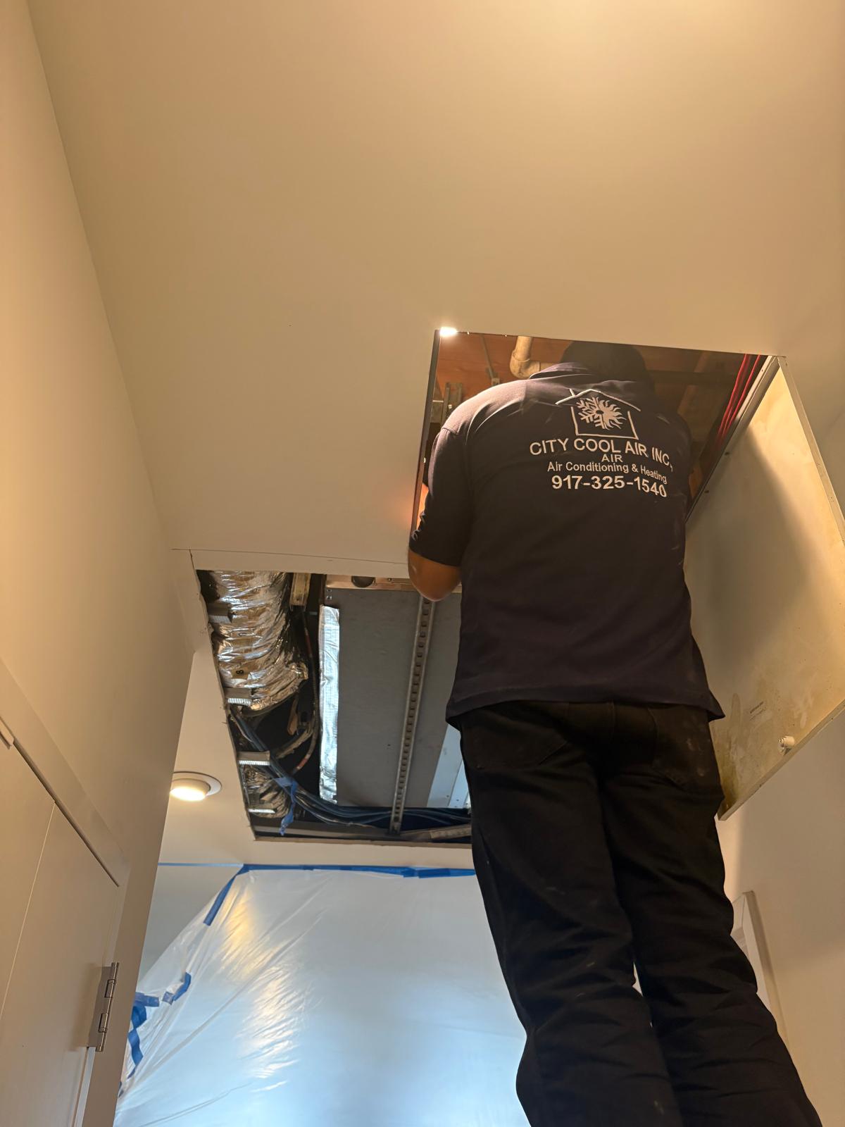 HVAC Technician Working